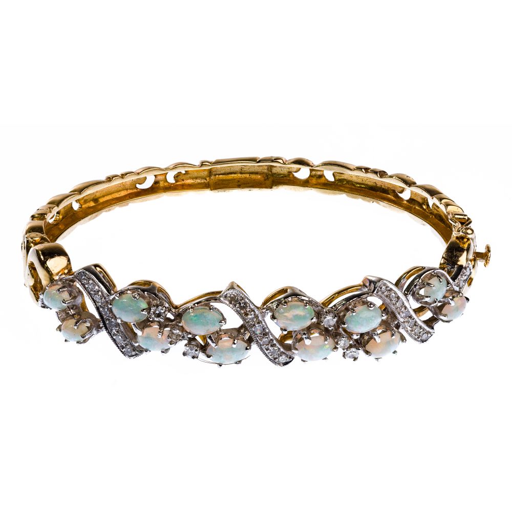 Appraisal: K YELLOW GOLD OPAL AND DIAMOND BRACELETHinged bangle having oval