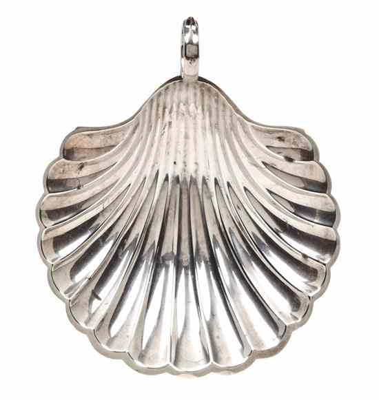 Appraisal: A Sterling Silver Shell Shaped Dish Fisher having an applied