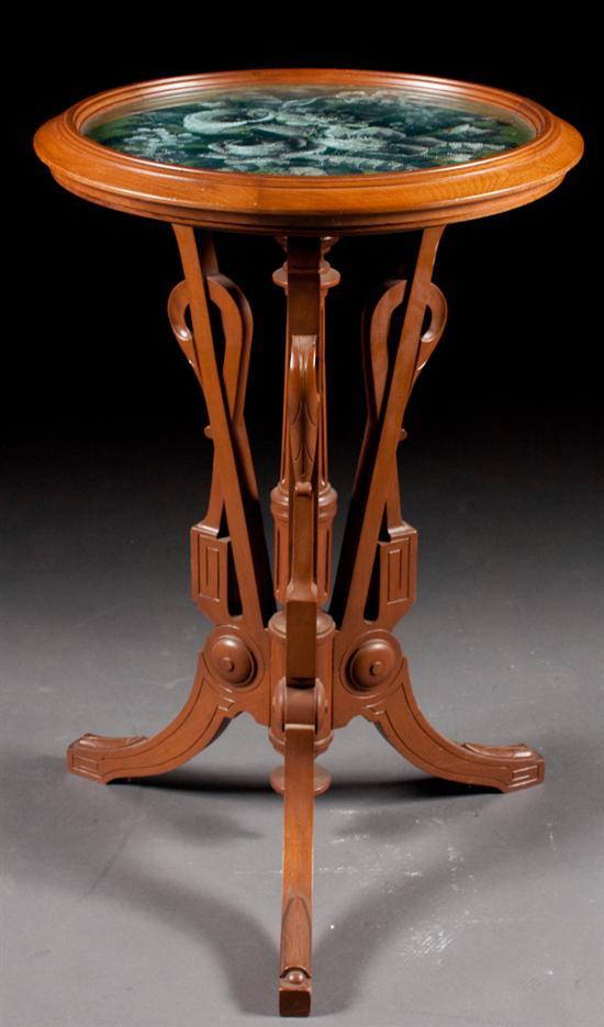 Appraisal: American Neo-Grec carved walnut stand mid th century with beeded