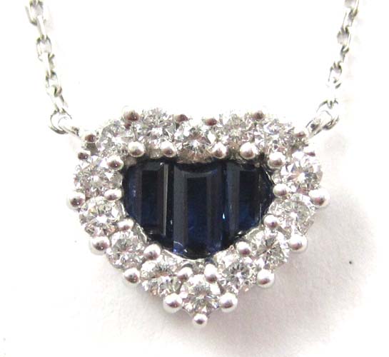 Appraisal: SAPPHIRE AND DIAMOND PENDANT NECKLACE Suspended on a inch chain