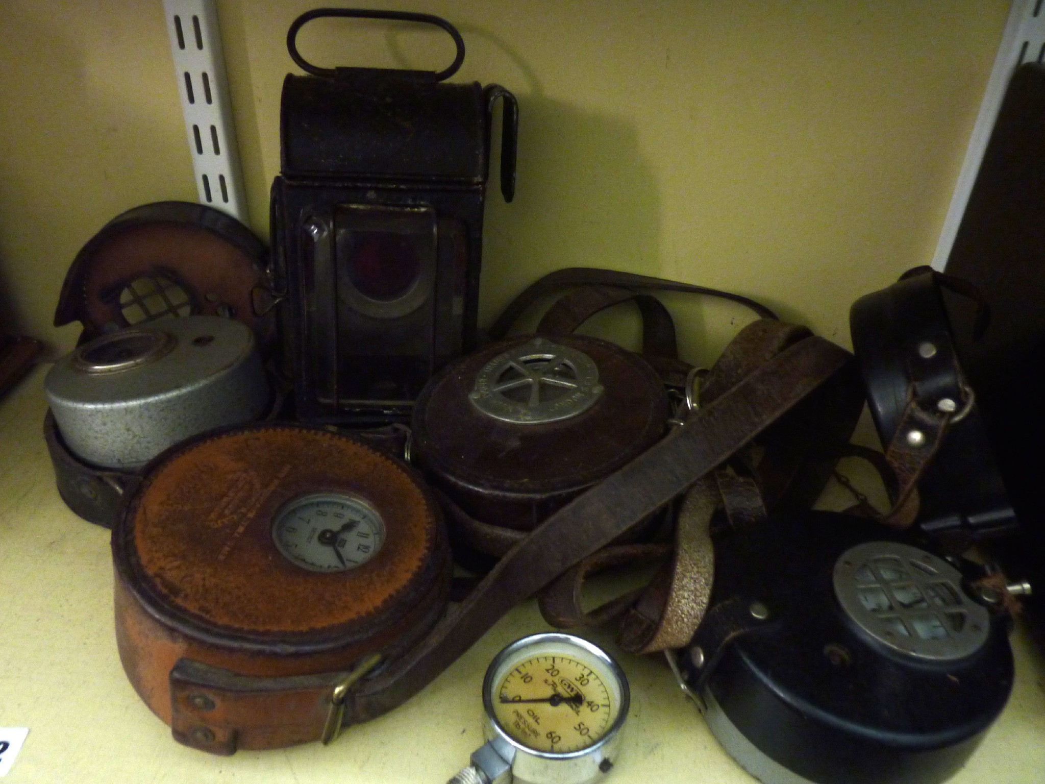 Appraisal: Four heavy duty leather and other cased gauges meters together