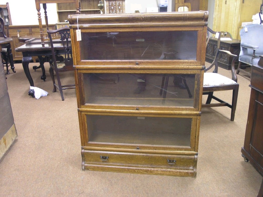 Appraisal: An oak Globe-Wernicke sectional bookcase three glazed sections above base