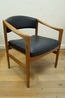 Appraisal: 'S TEAK BLACK UPHOLSTERD ARMCHAIR