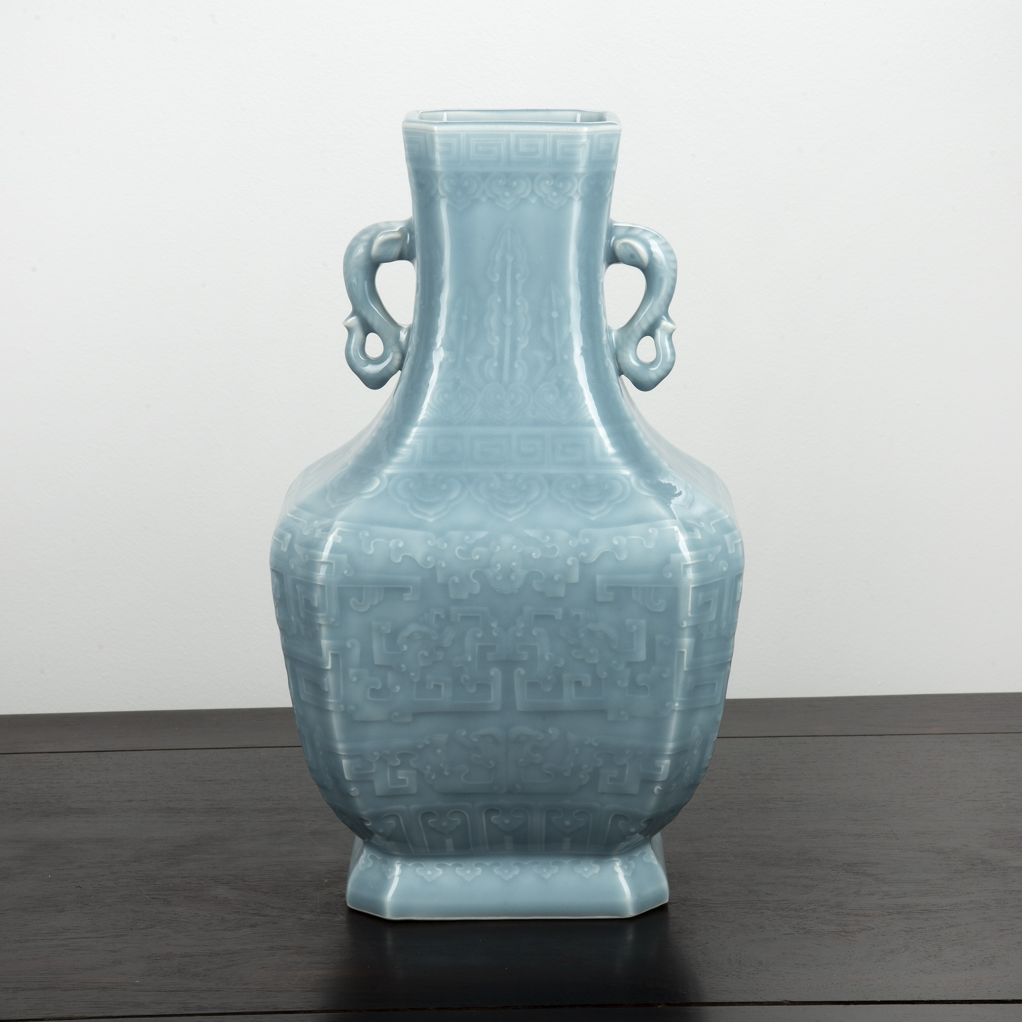 Appraisal: Pale blue glazed vase Chinese th Century decorated with slightly