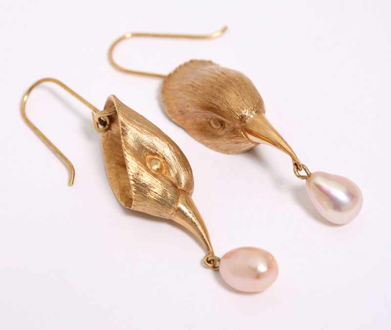 Appraisal: Each suspending a pink cultured pearl tested K yellow gold