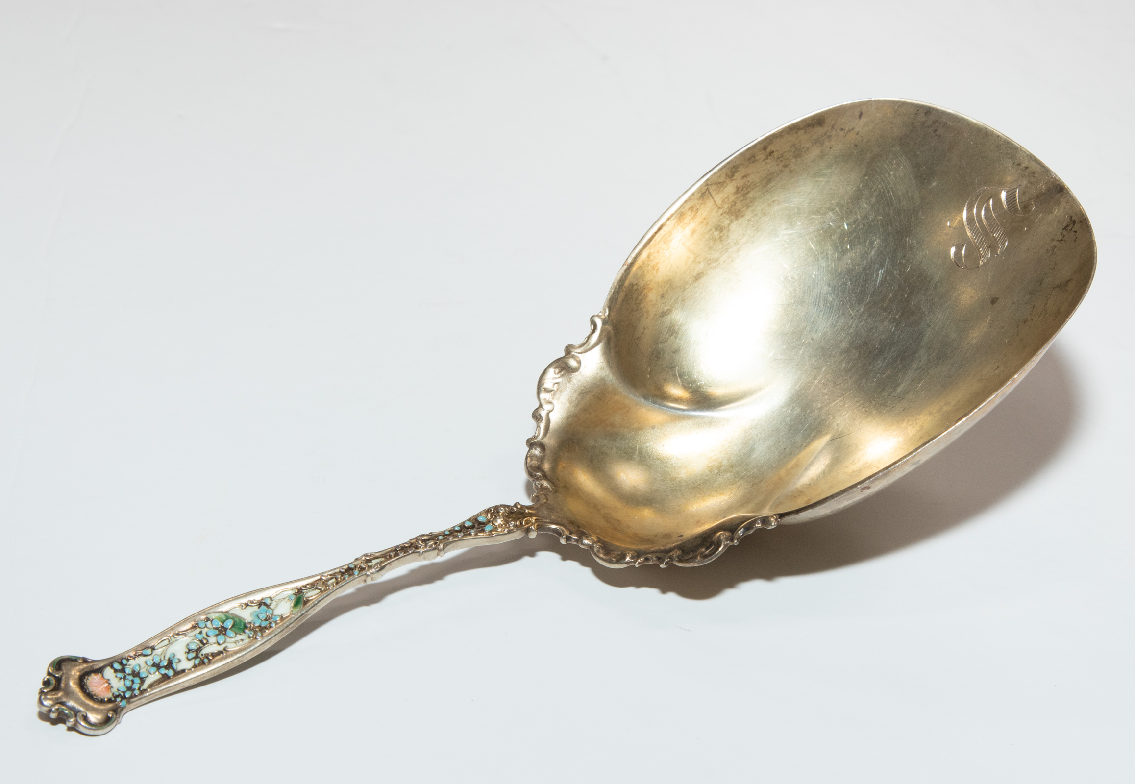 Appraisal: WHITING ENAMELED STERLING DRESDEN SERVING SPOON Monogrammed in L ozt