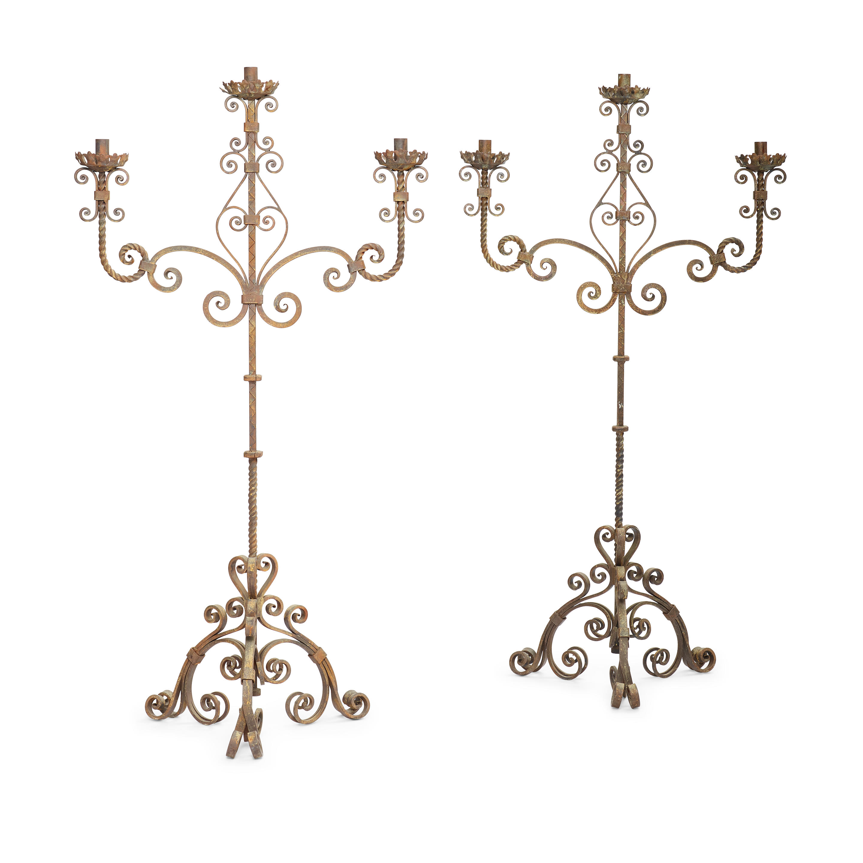 Appraisal: A PAIR OF WROUGHT IRON THREE-LIGHT TORCH RES height in