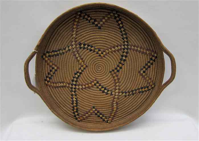 Appraisal: THOMPSON RIVER INDIAN ROUND BASKET TRAY with loop handles centered