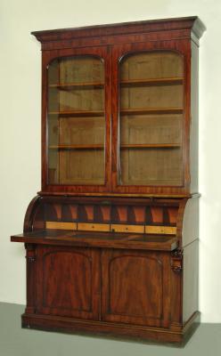 Appraisal: A VICTORIAN MAHOGANY BUREAU CABINET the moulded cornice over two