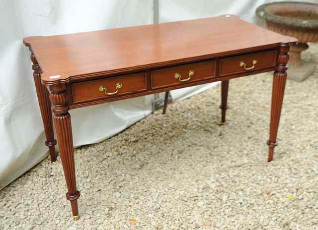 Appraisal: A GEORGIAN STYLE MAHOGANY CENTRE TABLE with three frieze drawers