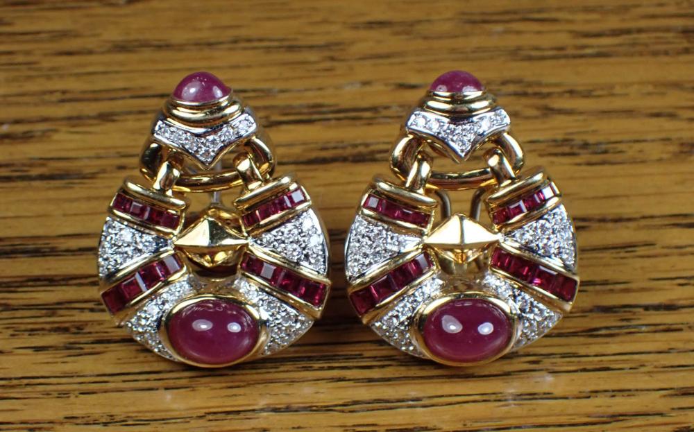 Appraisal: PAIR OF RUBY DIAMOND AND EIGHTEEN KARAT GOLD EARRINGS Each