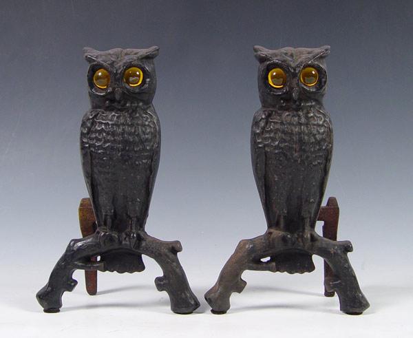 Appraisal: CAST IRON OWL ANDIRONS WITH GLASS EYES Painted black Yellow