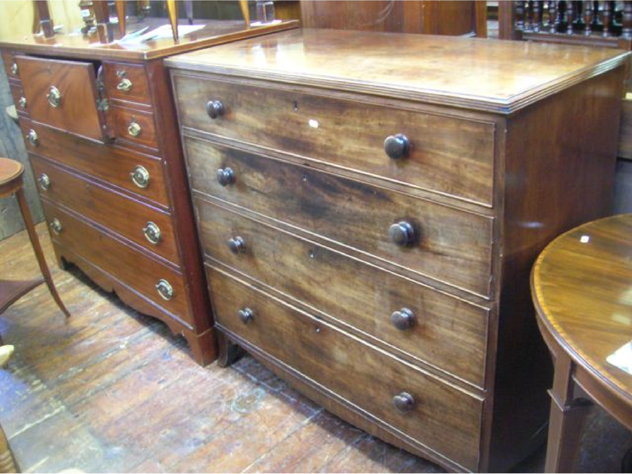 Appraisal: An early th century mahogany chest of four long graduated