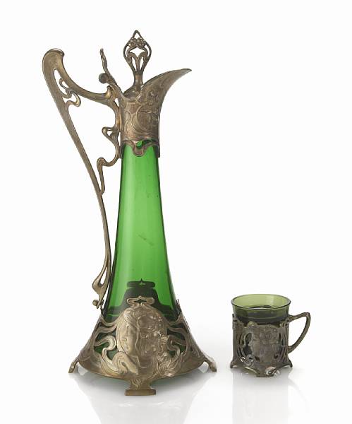 Appraisal: A WMF silvered metal and green glass claret jug and