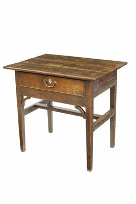 Appraisal: A George III oak side table the triple boarded top