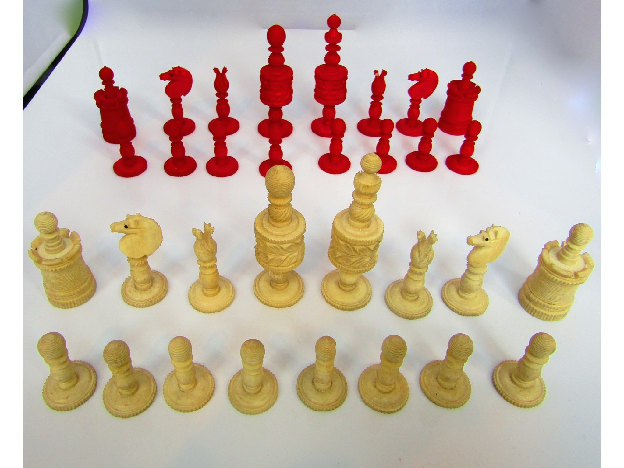 Appraisal: A complete antique eastern ivory chess set all with hand