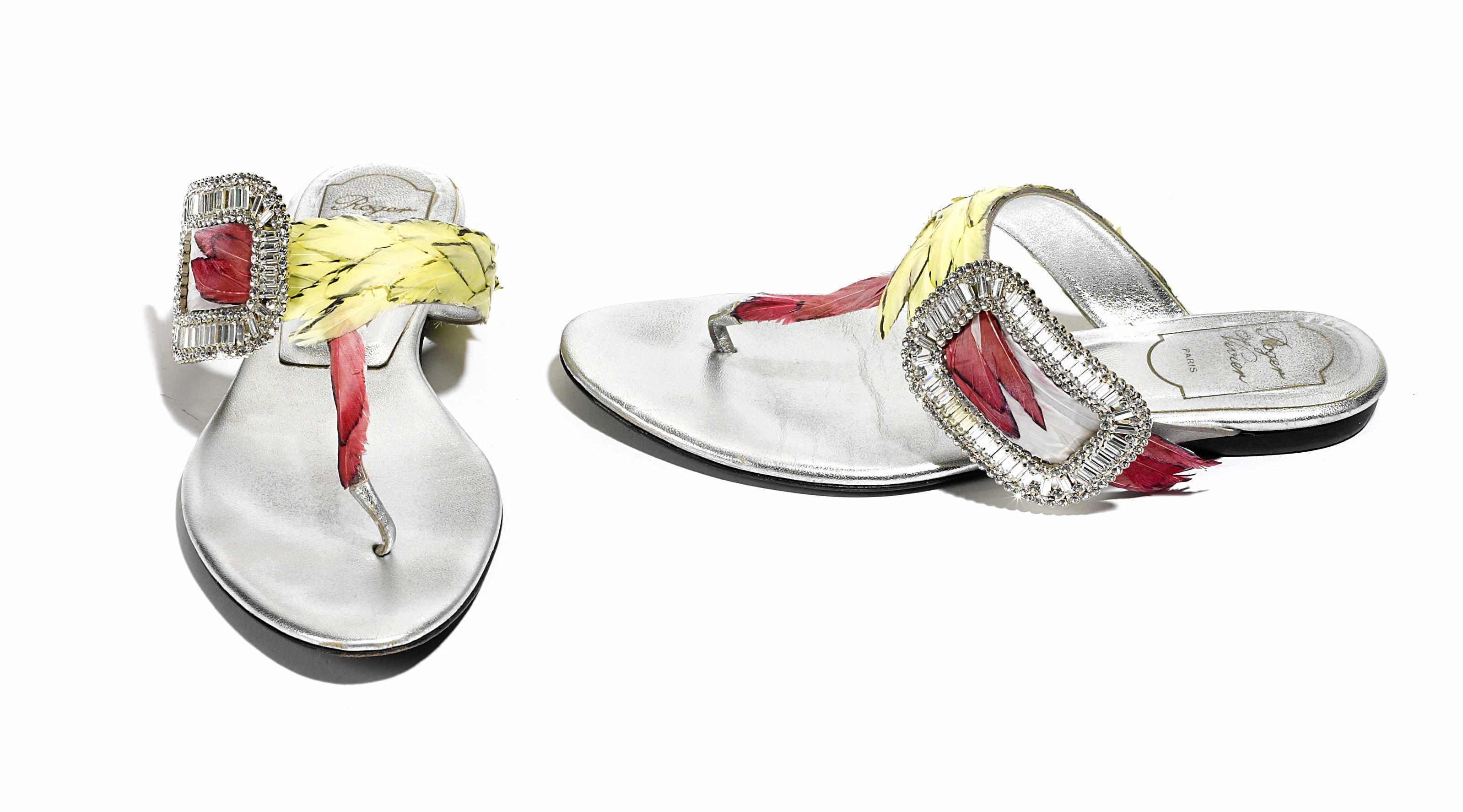 Appraisal: A pair of Roger Vivier silver leather and multicolored feather