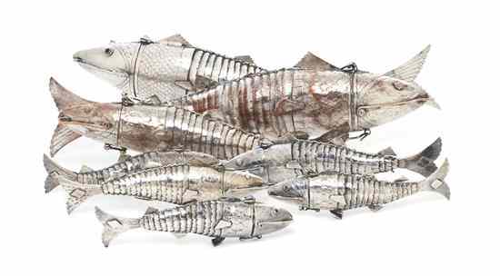 Appraisal: A Collection of Eight Silverplate Reticulated Fish of various sizes