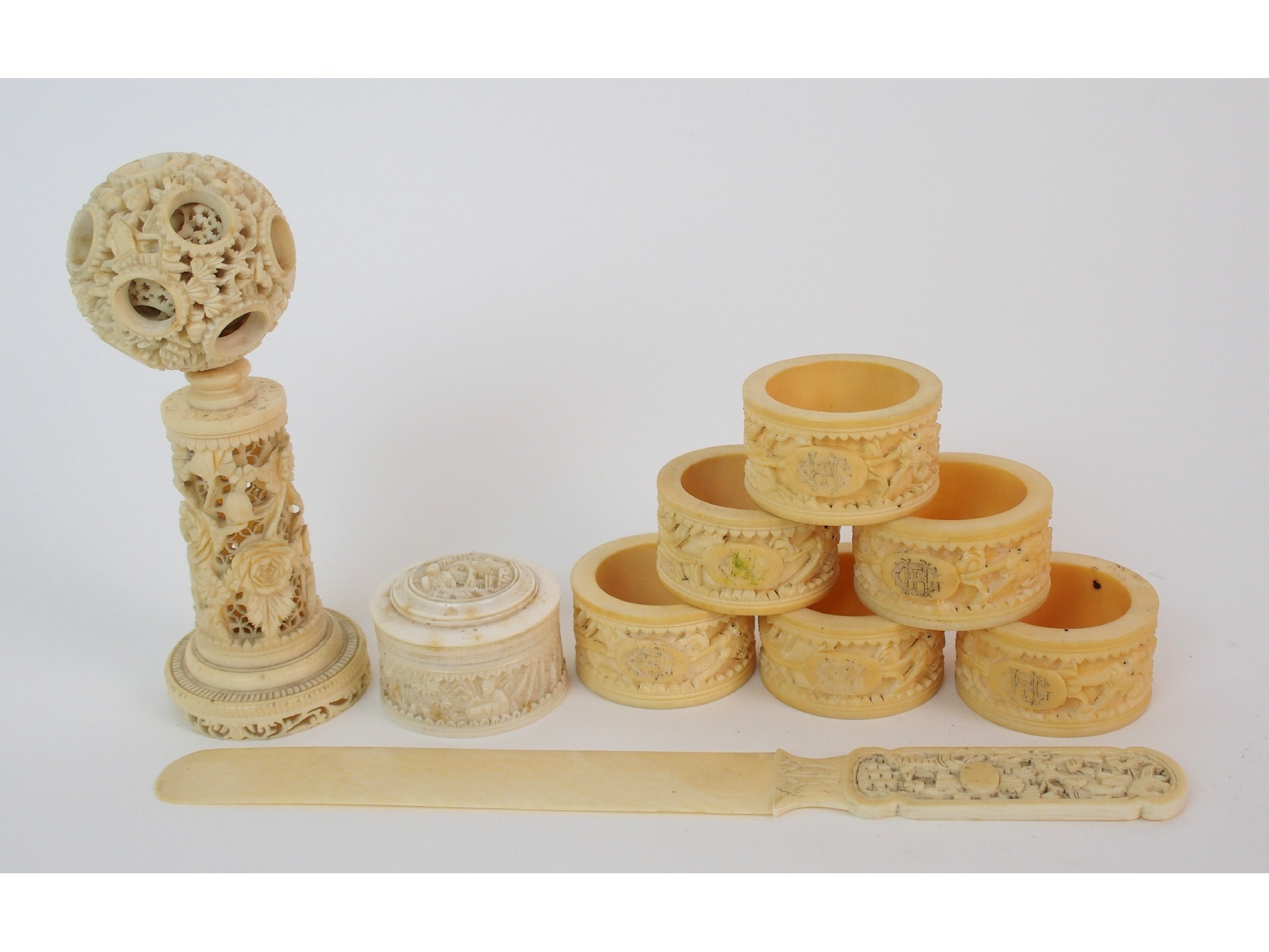 Appraisal: Six Cantonese ivory napkin ringsdecorated with dragons cm diameter paper