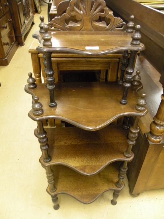 Appraisal: A mahogany three tier what-not in Victorian style