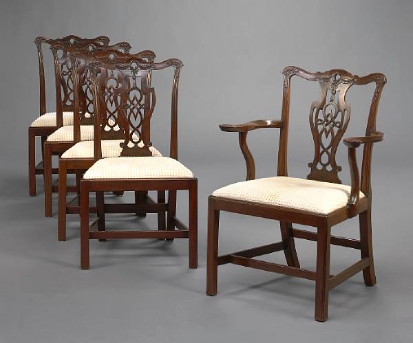 Appraisal: A set of thirteen George III style mahogany dining chairs