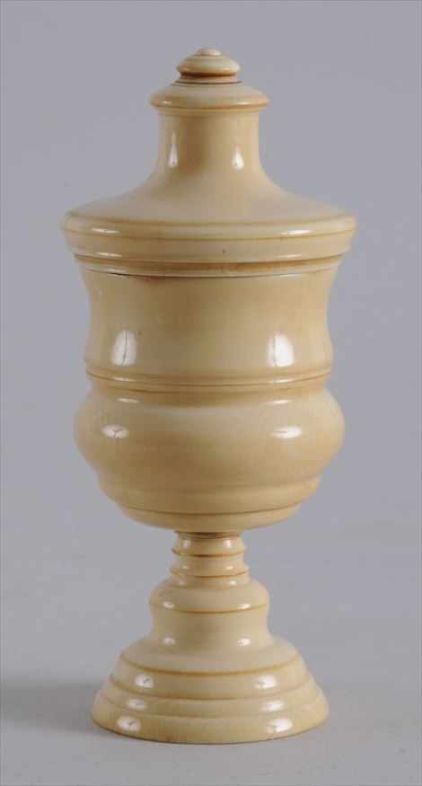 Appraisal: RUSSIAN TURNED IVORY GOBLET AND COVER The shaped bowl on