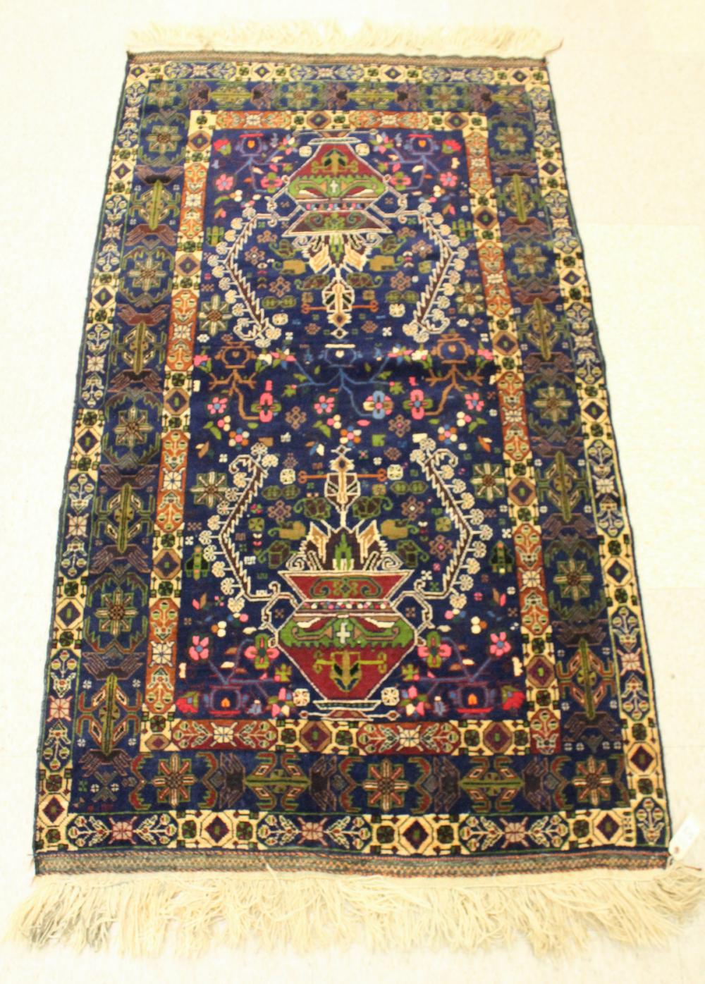 Appraisal: HAND KNOTTED AFGHAN AREA RUG double urn design with flowers