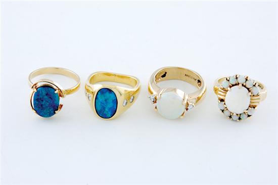 Appraisal: Opal rings center oval cabochon opal x mm and ten