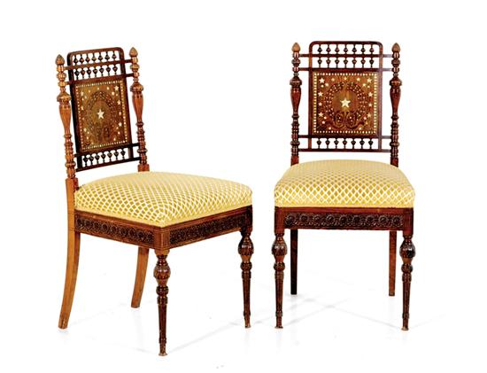 Appraisal: Pair Victorian Aesthetic Movement rosewood and mother-of-pearl side chairs last