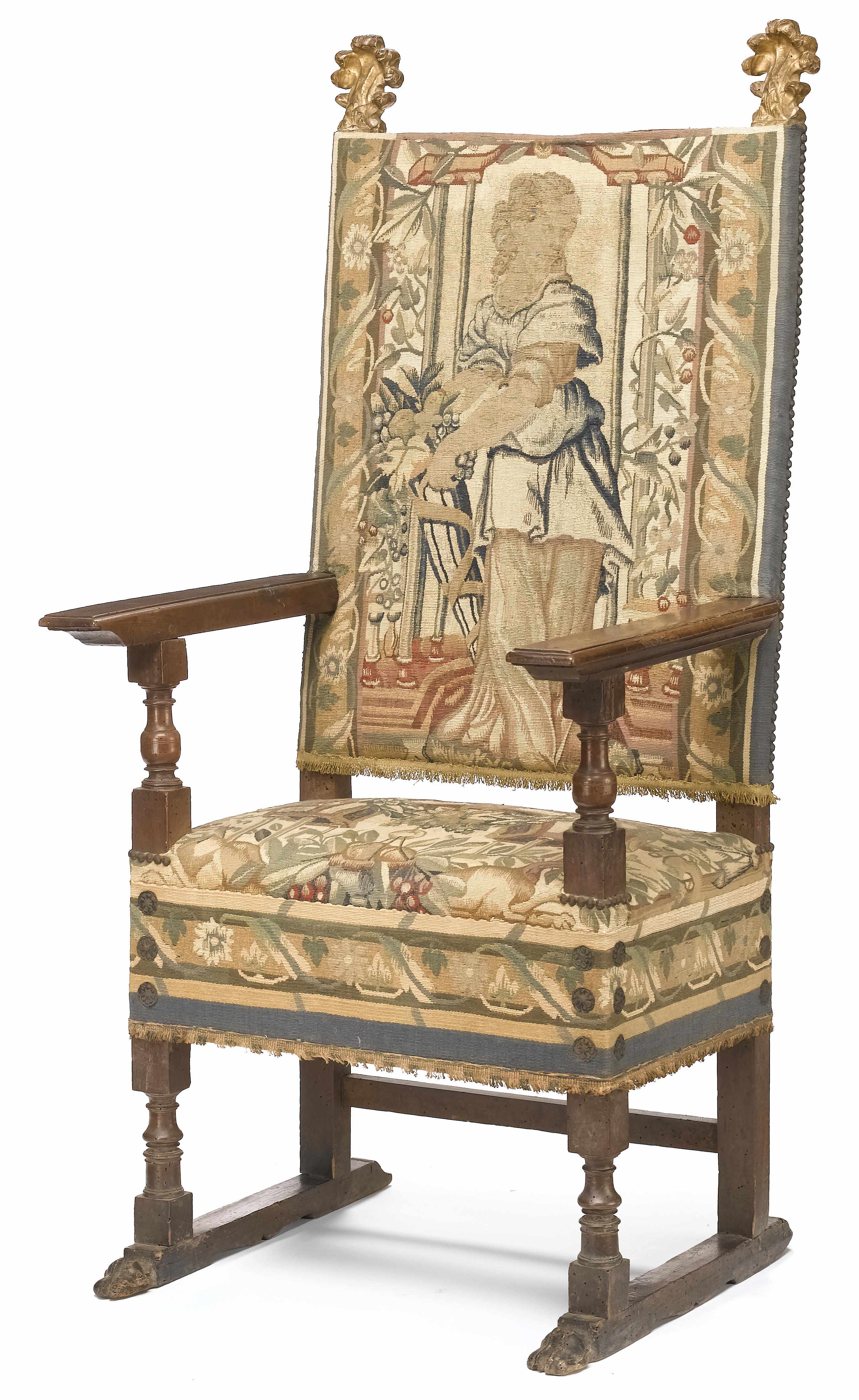 Appraisal: An Italian Baroque parcel gilt walnut tapestry upholstered armchair late