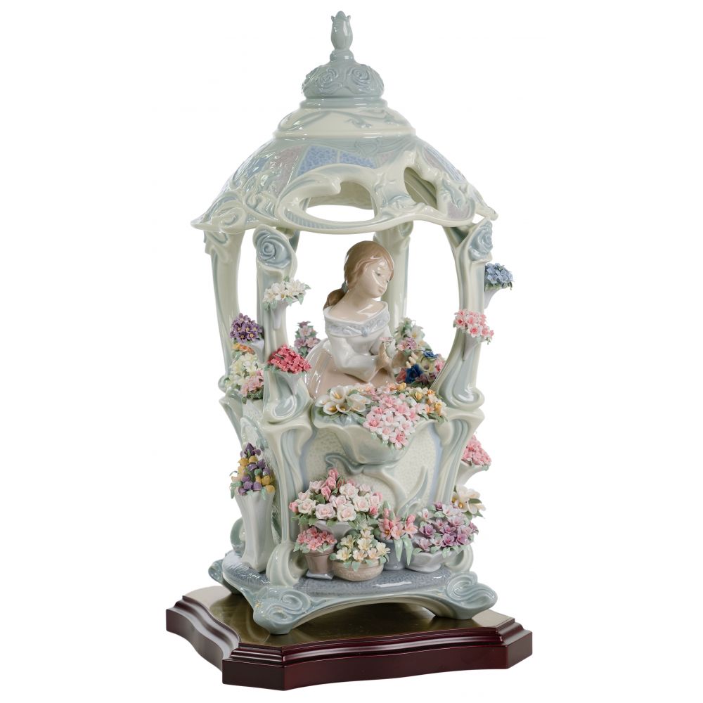 Appraisal: LLADRO GAZEBO IN BLOOM FIGURINERetired glazed finish including original box