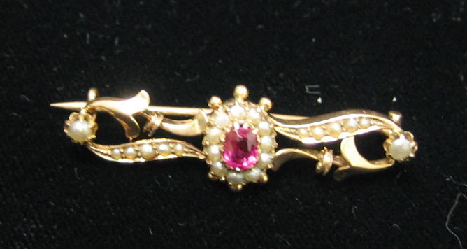 Appraisal: ANTIQUE RUBY AND PEARL BROOCH k yellow gold brooch set