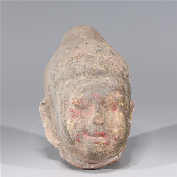 Appraisal: Antique Indian carved stoned head with some traces of gilt