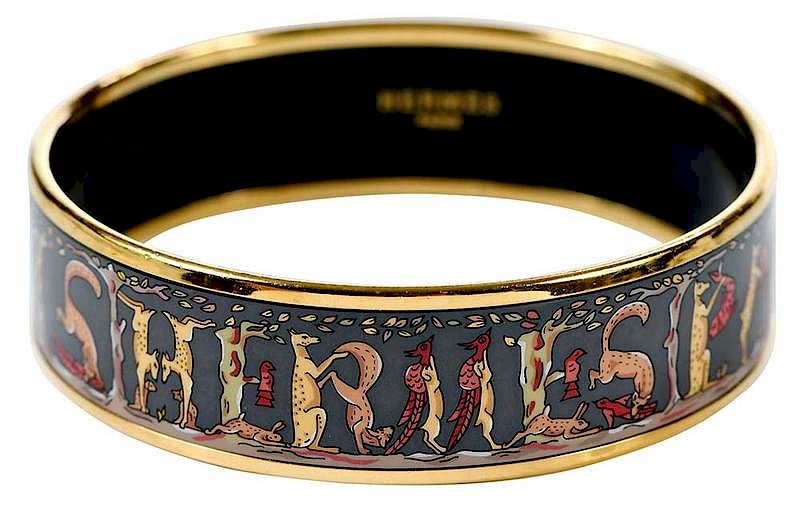 Appraisal: Herm s Bangle Bracelet gold-tone rim gray background with animal