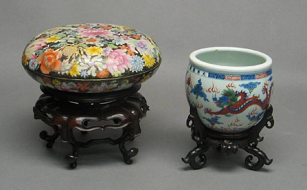 Appraisal: Two porcelain containers The first a circular covered box brilliantly