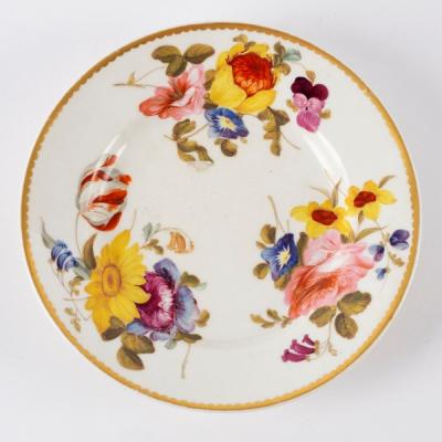 Appraisal: A Derby plate painted summer flowers within a gilt border