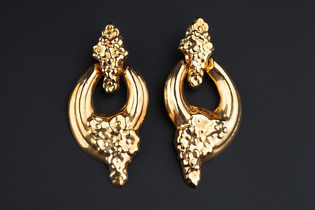 Appraisal: A PAIR OF EAR PENDANTS each hoop-shaped drop decorated with