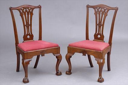 Appraisal: PAIR OF CHIPPENDALE CARVED MAHOGANY SIDE CHAIRS Each serpentine top