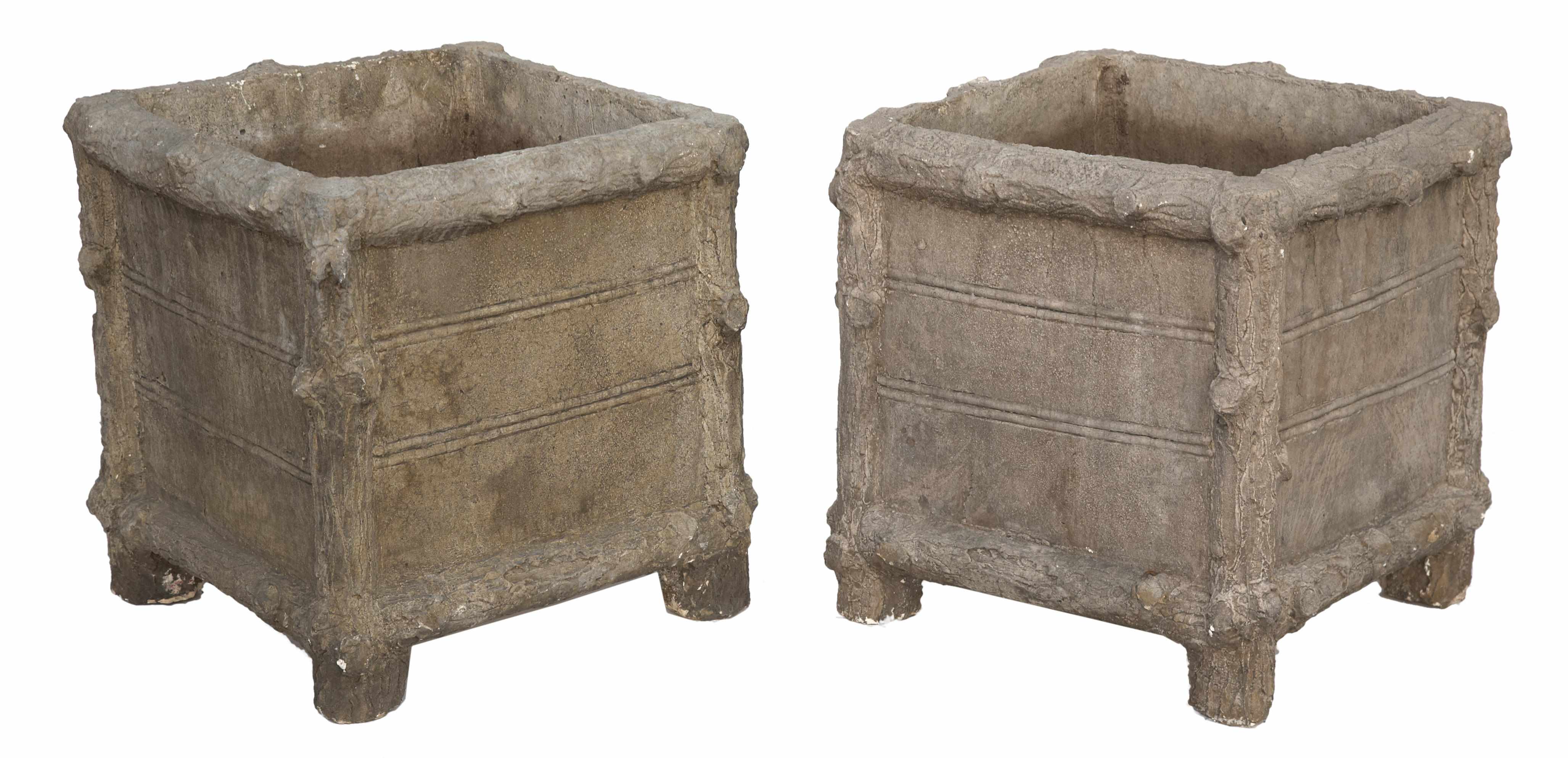 Appraisal: A pair of cast stone square form jardinires height in