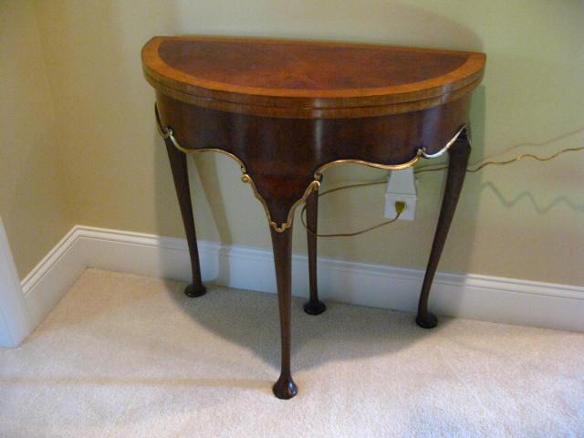 Appraisal: Demilune Game Table with hinged top mahogany with light wood