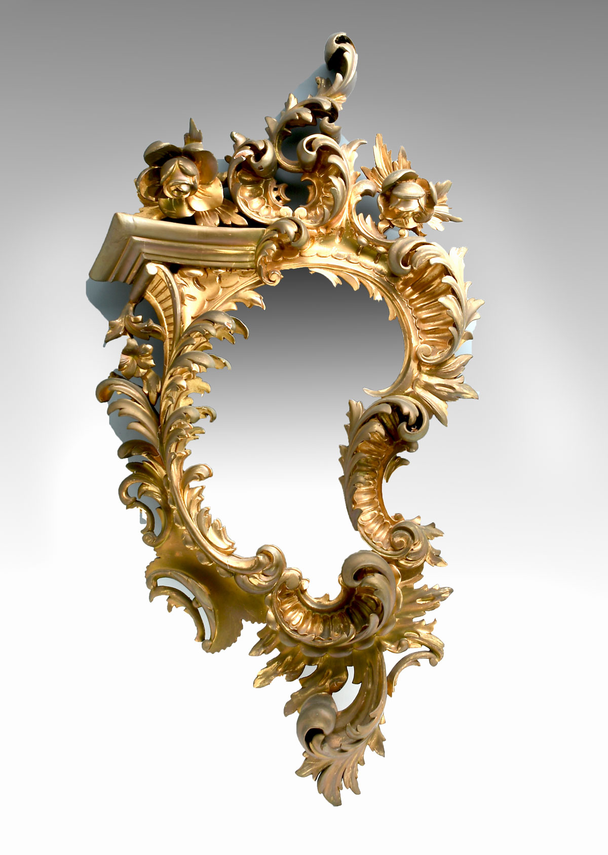 Appraisal: ITALIAN GILDED GESSO MIRROR Beveled mirror having an immensely carved