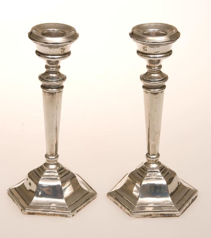 Appraisal: PAIR OF SILVER COLUMNAR CANDLESTICKS in th century style modern