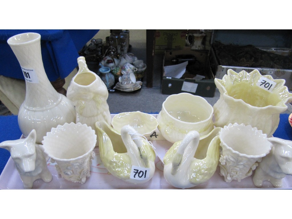 Appraisal: Quantity of Belleek including vase two swans two dogs etc