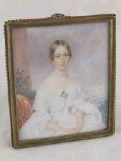 Appraisal: A portrait miniature on ivory of young lady x cm