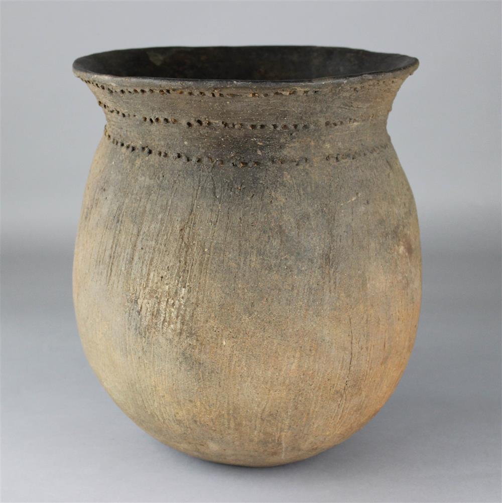 Appraisal: WOODLAND GLOBULAR POT WITH DEEP FLARING RIM body is tempered