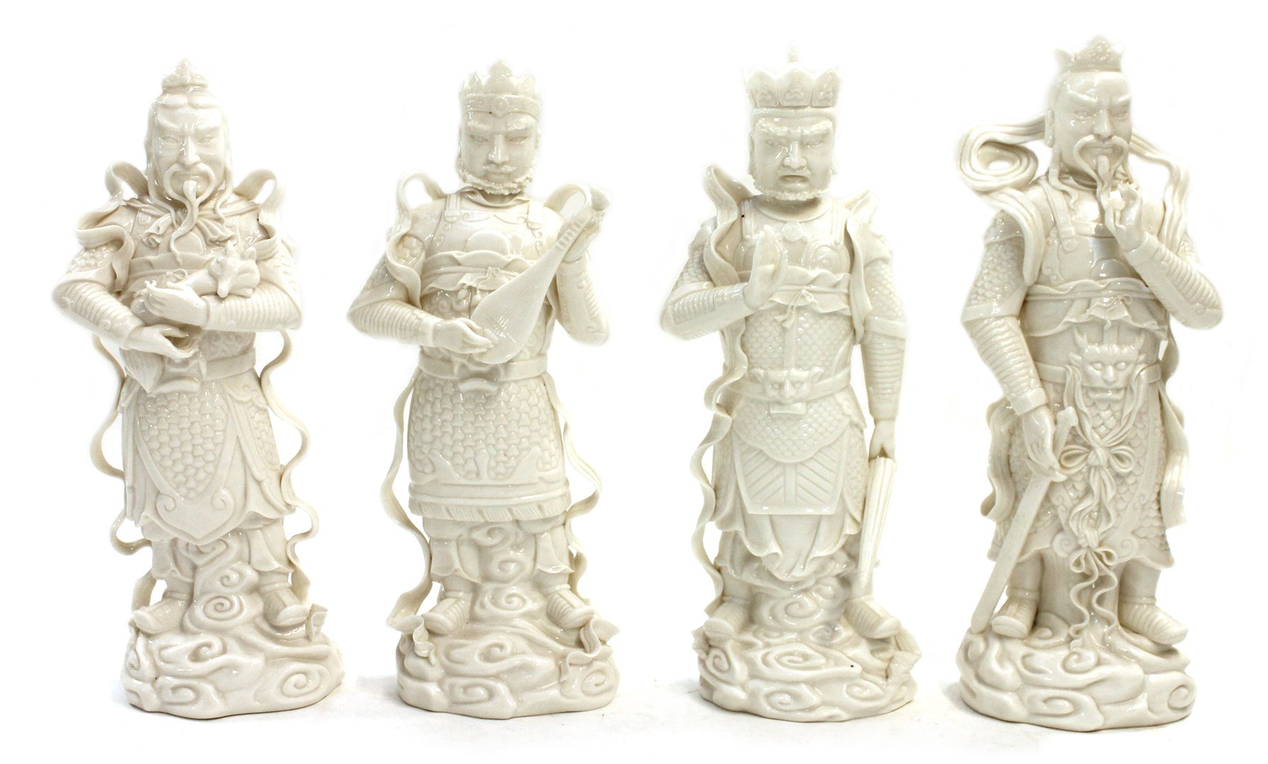 Appraisal: A set of four modern Chinese white glazed figures of