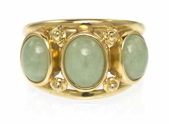 Appraisal: A Karat Yellow Gold and Jade Ring containing three oval