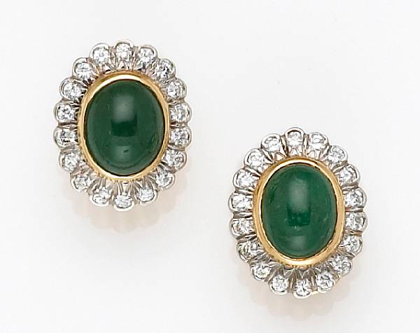 Appraisal: A pair of emerald diamond and platinum-topped gold clip-earrings Tiffany