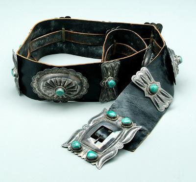 Appraisal: Navajo concha belt five deeply embossed and tooled silver conchas