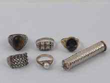 Appraisal: A mixed lot comprising two carat gold rings and four